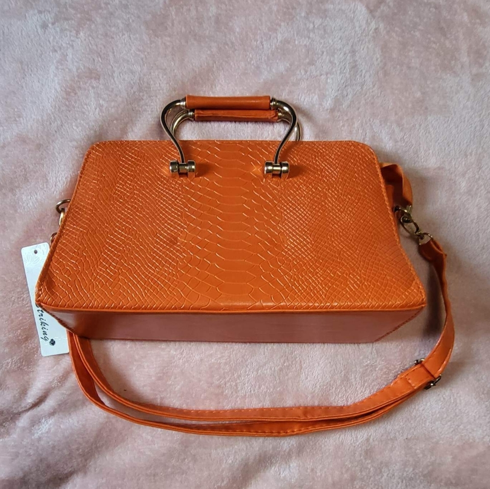 Orange striking purse